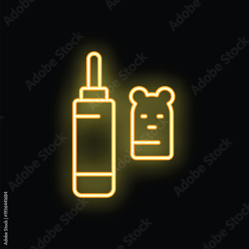 Yellow glowing neon icon of a glue stick and a teddy bear craft project, isolated on a black background