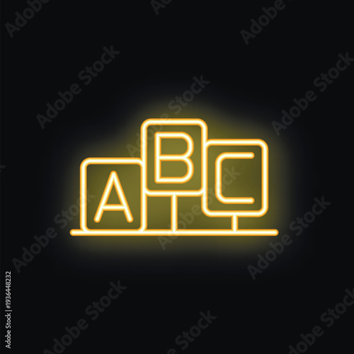 Neon sign is glowing yellow and representing the concept of education with three cubes showing letters a, b, and c