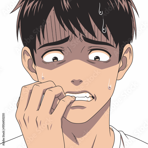 Anxious young man biting his nails with a worried expression.