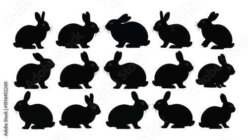 A group of black rabbit silhouettes on a white background