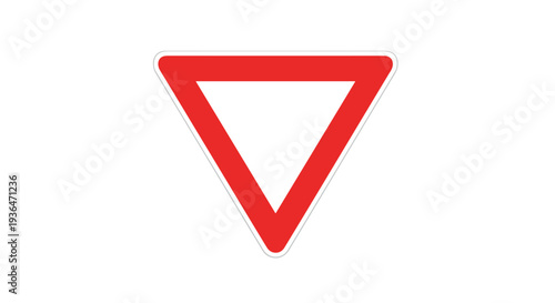 Red and white inverted triangular traffic sign serves as a yield warning for drivers approaching an intersection.