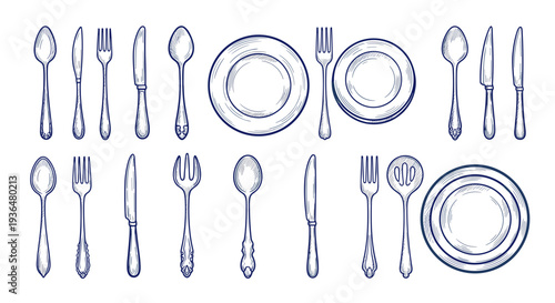 Set of vintage silverware including forks knives and spoons arranged