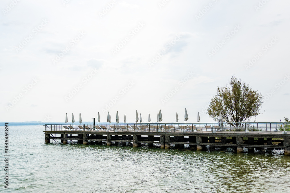 custom made wallpaper toronto digitalWooden pier with lounge chairs and umbrellas on Lake Garda
