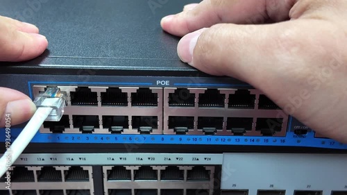 LAN cable clamp for inserting into the switch slot. Network communication technology