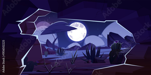 Cave in rock and desert landscape at night