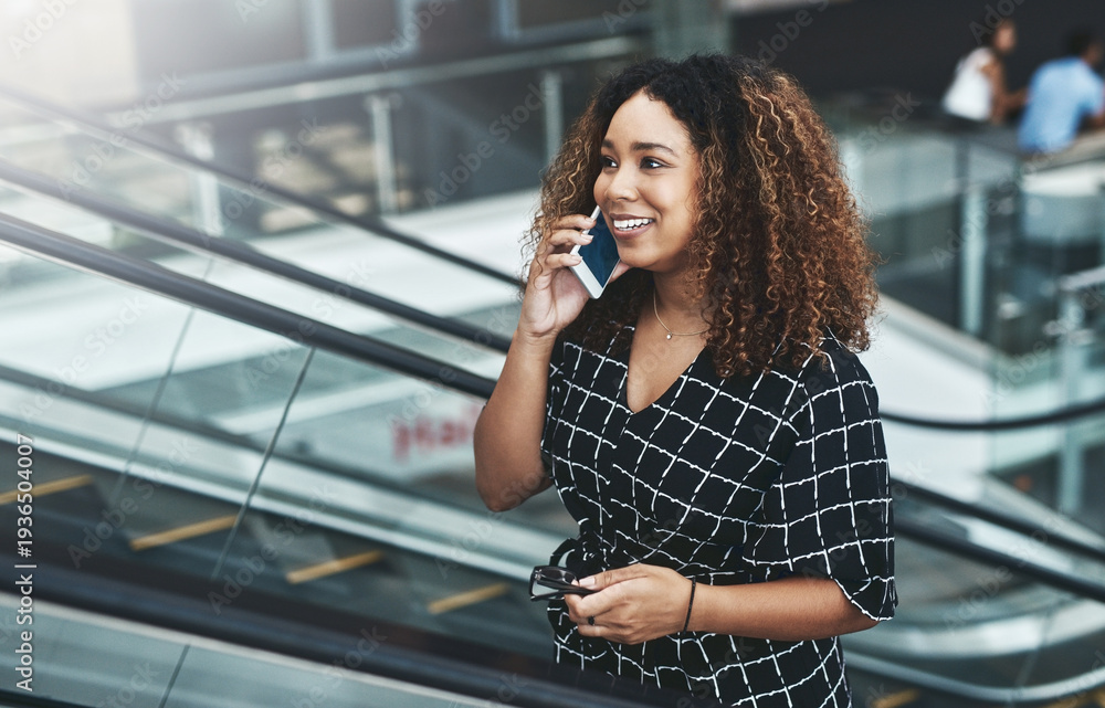 Fototapeta premium Phone call, office and business woman on escalator for networking, contact and online discussion. Professional, commute and person on smartphone for communication, connection and talking for meeting