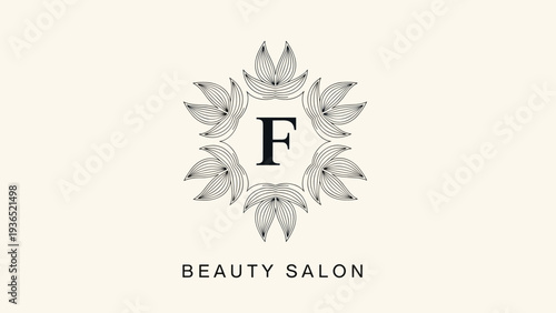 Delicate beauty salon logo featuring the letter f inside a fine circular floral wreath on a neutral cream background for branding.