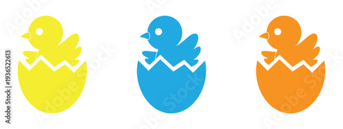 Newborn chick hatching from a cracked egg in  representing new beginnings, birth, innocence, and the concept of life. Colorful Easter chick hatching from eggs. 