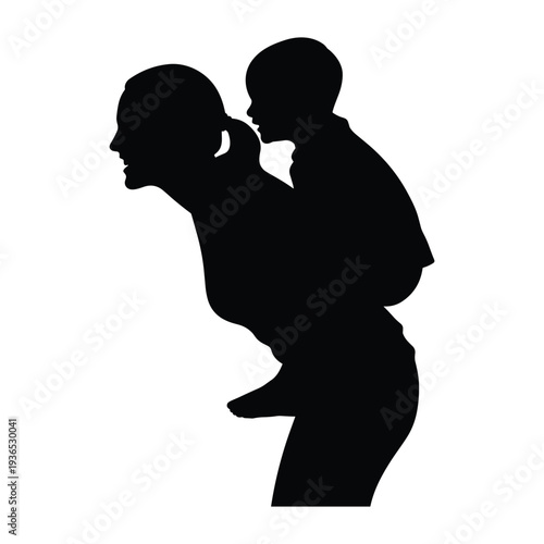 Silhouette of man carrying happy child on shoulders in playful pose