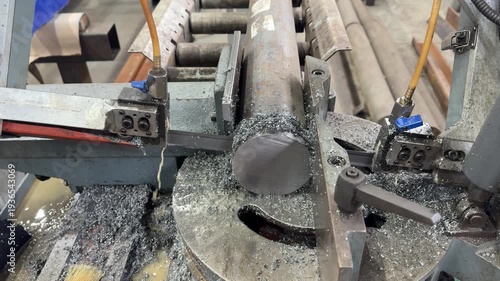 Metalworking machine saw cutting a steel bar, with sparks flying, precise blade action, and coolant spray ensuring clean, accurate cuts.