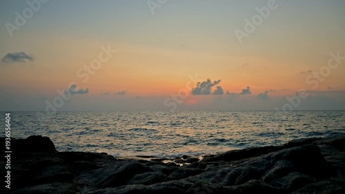 Time lapse stunning scenery of the coastline with moving current during sunrise. Fast motion footage of the sea with beautiful cloudy sky at Koh Samui, Surat Thani Province, Thailand.