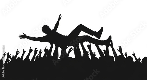 Silhouette of a person falling into a crowd with outstretched arms and legs conveying a sense of freedom and trust