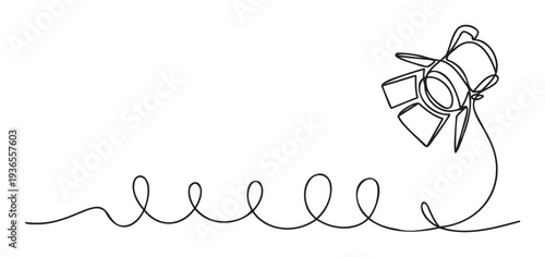 Continuous line drawing of a professional studio spotlight with barn doors connected by a coiled cable, ideal for entertainment industry branding, movie production themes, or theatrical