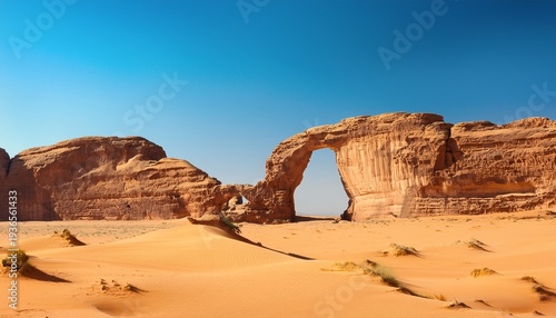 Desert Elephant Rock Jabal Al Fil Arches Rise From Golden Sand Under Clear Blue Sky Timeless Landscape