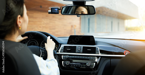 Canvas Print Asian girl driving a car