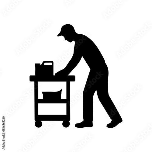 Worker pushing service cart providing cleaning maintenance