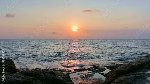 Stunning view of coastal with waves crashing the rocks during sunrise at Koh Samui, Surat Thani Province. Tranquil scene in the morning with beautiful scenery of the sea in Thailand.