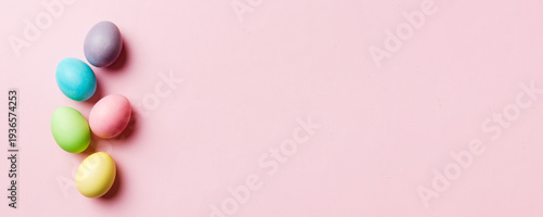Wallpaper Mural holiday preparation Multi colors Easter eggs on colored background . Pastel color Easter eggs. holiday concept with copy space Torontodigital.ca