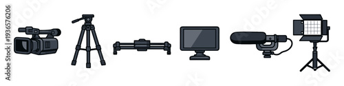 Collection of video production equipment including camera, tripod, slider, monitor, microphone, and light
