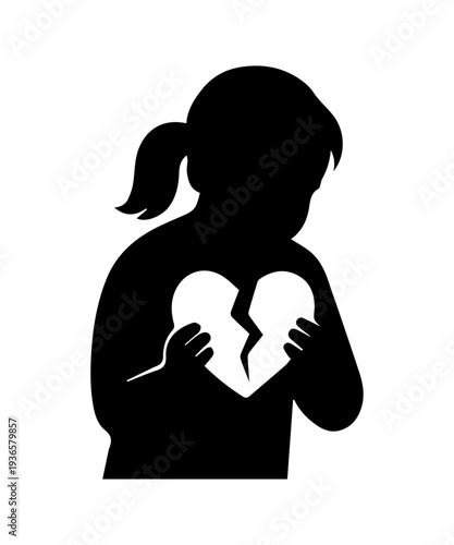 Child silhouette holding broken heart feeling sadness