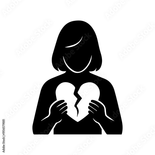 Woman silhouette holding broken heart feeling sadness