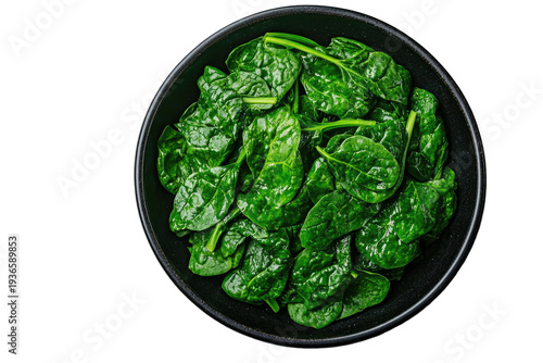 Fresh spinach in a dark bowl, vibrant green leaves