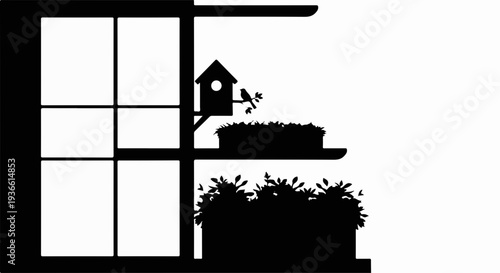 Silhouette of a birdhouse and plants on a balcony seen through a window