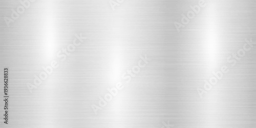 Abstract a polished metallic surface shimmering with subtle textures, reflecting light with soft gradients, creating a sense of understated sophistication and industrial elegance.