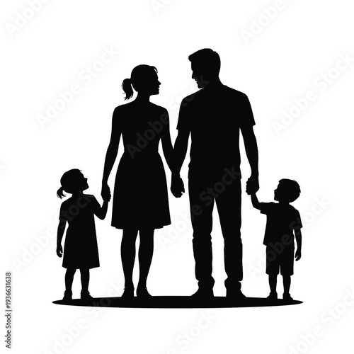 Silhouetted family of four standing together holding hands