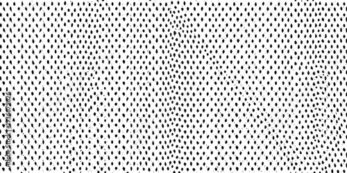 Dense pattern of small irregular black shapes on a white background