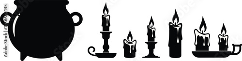 Black silhouette of urn and lit candles on holders candle holder