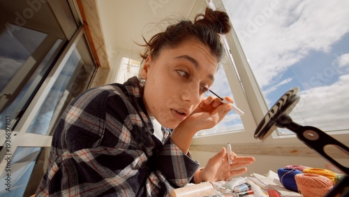 Professional beauty routine captured during studio photoshoot preparation