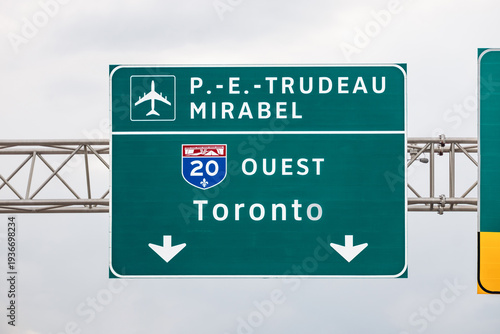 Obraz na płótnie Montreal, Canada - August 24, 2025: Highway sign for Autoroute 20 West toward To