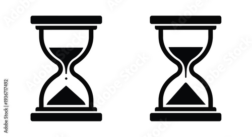 Two black hourglasses displaying different sand levels a striking silhouette