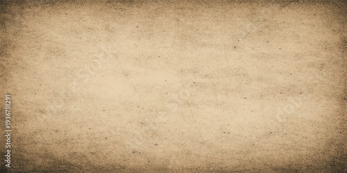Vintage aged brown parchment with a stained grunge paper texture and worn antique pattern for a blank retro design sheet