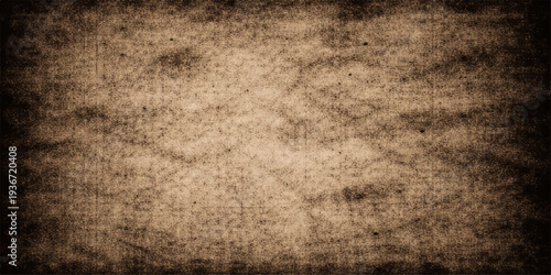 Ancient aged parchment with a worn grunge paper texture and dirty brown sepia stains creates a vintage retro background on a rough antique blank sheet