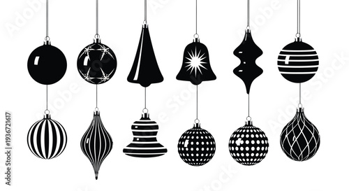 Black and white Christmas ornaments hanging in various patterns
