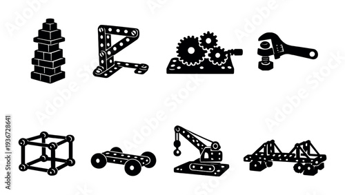 Construction parts and assembled models on dark background