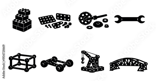 Toy building blocks and mechanical parts on dark background