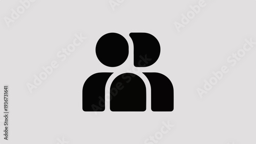 Simple black icon of two people together symbolizing teamwork partnership and collaboration in a minimalist design on a light gray background