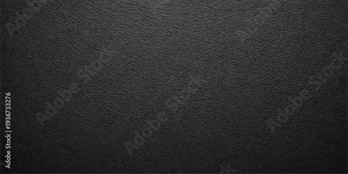 Dark textured black leather surface with a macro rough skin pattern and grunge material backdrop for design wallpaper