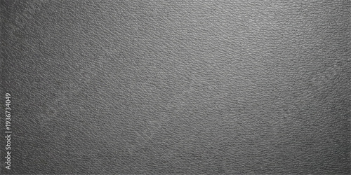 A dark grey and black leather material texture featuring a rough macro surface pattern for a blank fabric or skin backdrop wallpaper
