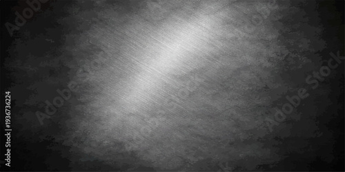 A dark vintage metallic background features a rough grunge steel plate texture with a dirty old gray surface and weathered black stone pattern for a textured industrial backdrop