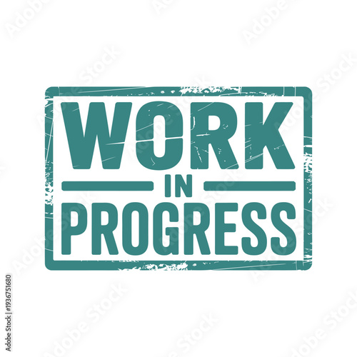 A teal stamp displaying the phrase work in progress in bold lettering