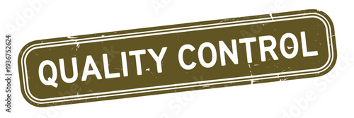 A rectangular olive green stamp displaying the words quality control in white