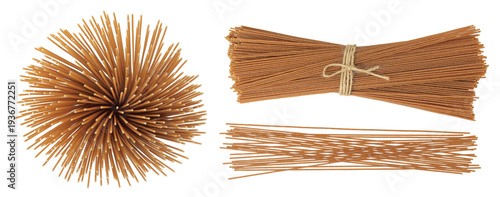 raw wholegrain spaghetti isolated on a white background. Top view. Flat lay