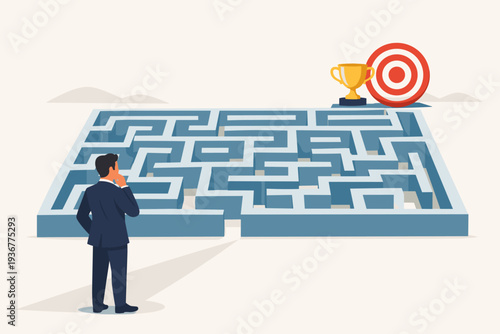 Businessman standing in front of complex maze looking for path to success, target and gold trophy at the end of labyrinth, concept of business strategy, problem solving, and goal achievement.