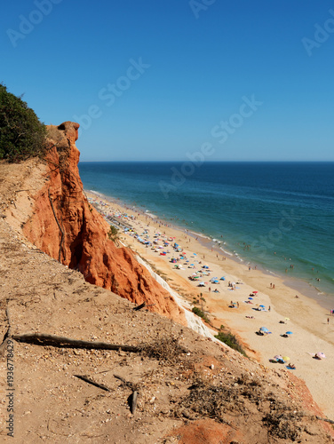 Portuguese Coast Algarve, beach – documentary style, real world, authentic situation, natural light, genuine moment captured by human photographer, no ai