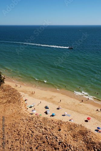 Portuguese Coast Algarve, beach – documentary style, real world, authentic situation, natural light, genuine moment captured by human photographer, no ai