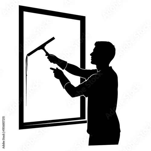 A man in silhouette cleaning a window with a squeegee
